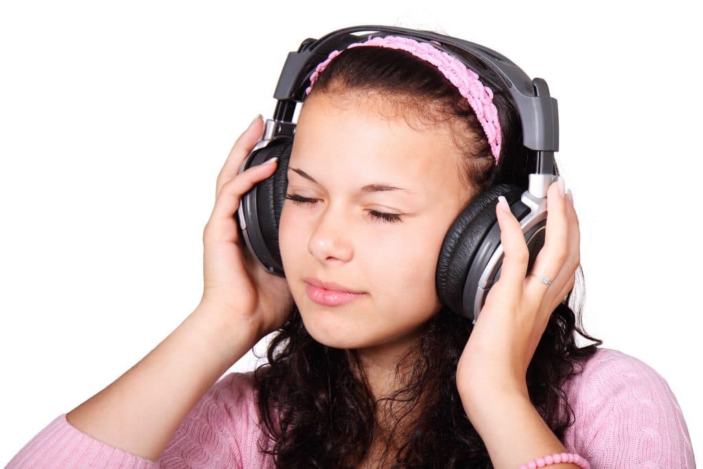 cute girl listening to music