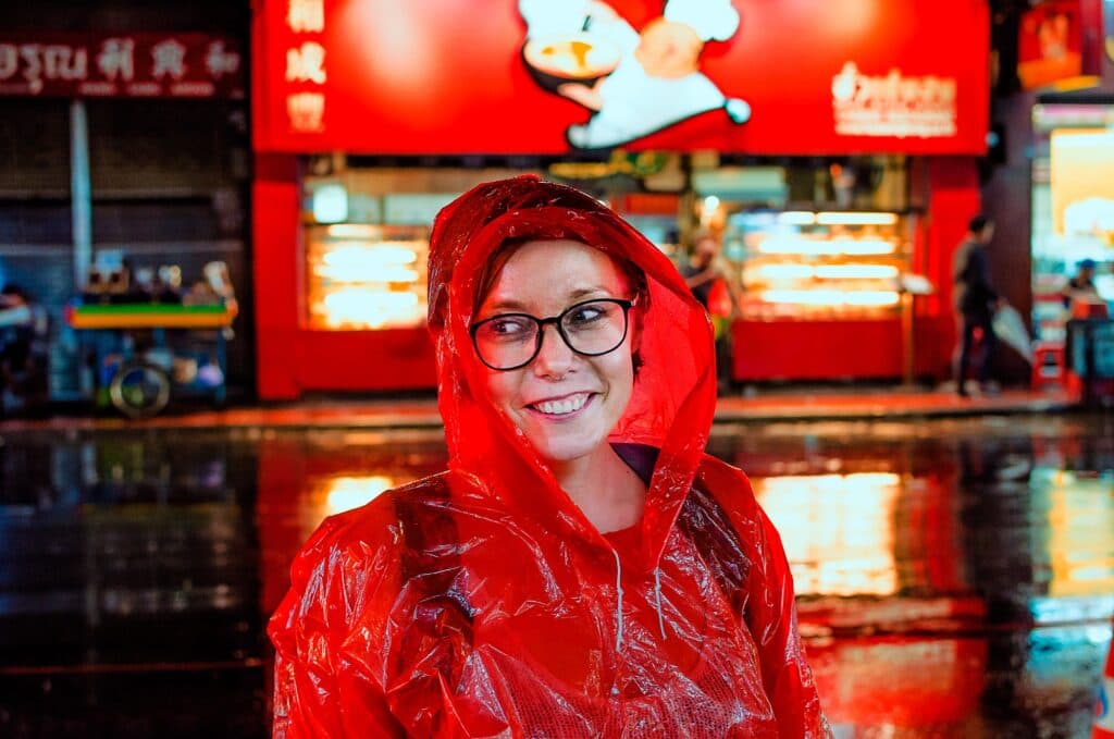 Joanna in a red cape at Chinatown in Bangkok.